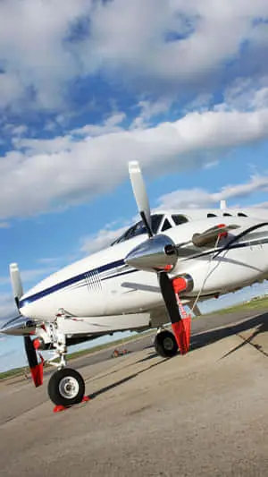 Small Airplane On The Ground Background