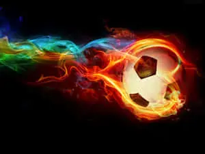 "A ball against a vivid backdrop of orange, pink, and purple." 