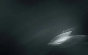 a black and white abstract background with a light
