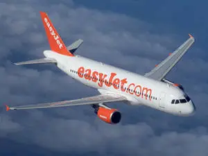 EasyJet's Bright Orange Tail Against the Sky.