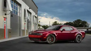 Red Dodge Challenger Demon 4K In Front Of A Building