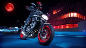 Rider With Black Yamaha MT 15 Under The Red Moon