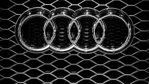 Silver Audi Car Emblem In Solid Black